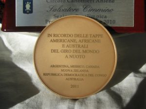 The medal awarded to Salvatore Cimmino by Italian President Giorgio Napolitano in appreciation of his swimming world tour